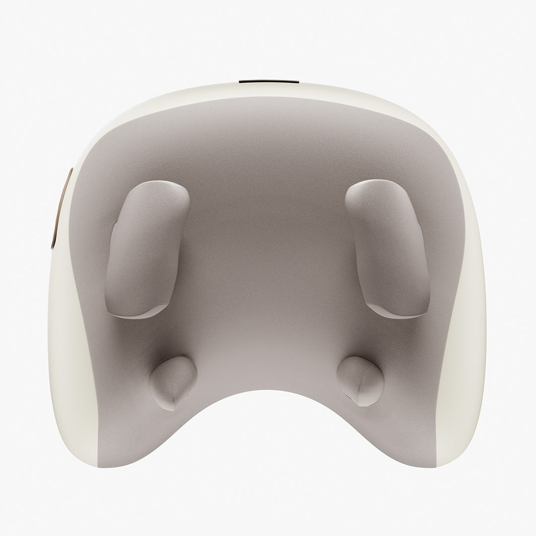 NUVEARA neck and shoulder massager in a calm home setting